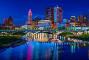 An image of Cincinnati, Ohio at night overlooking the bay